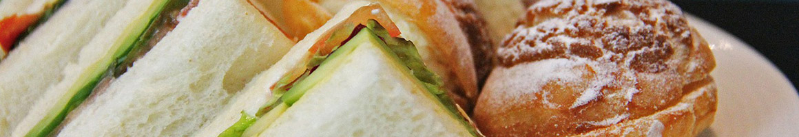 Eating Deli Sandwich at NY Garden Deli & Cafe restaurant in San Diego, CA.